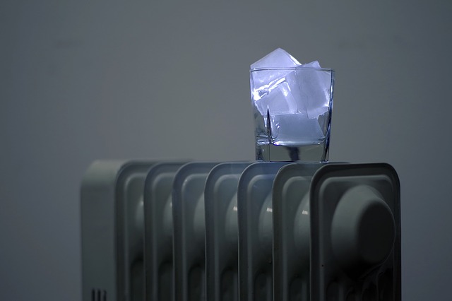 Glass of ice on heater