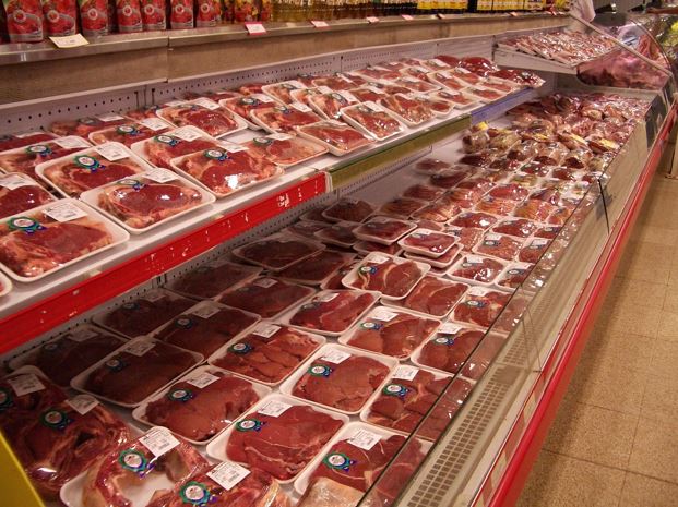 Fresh meat on display in meat serve over counter
