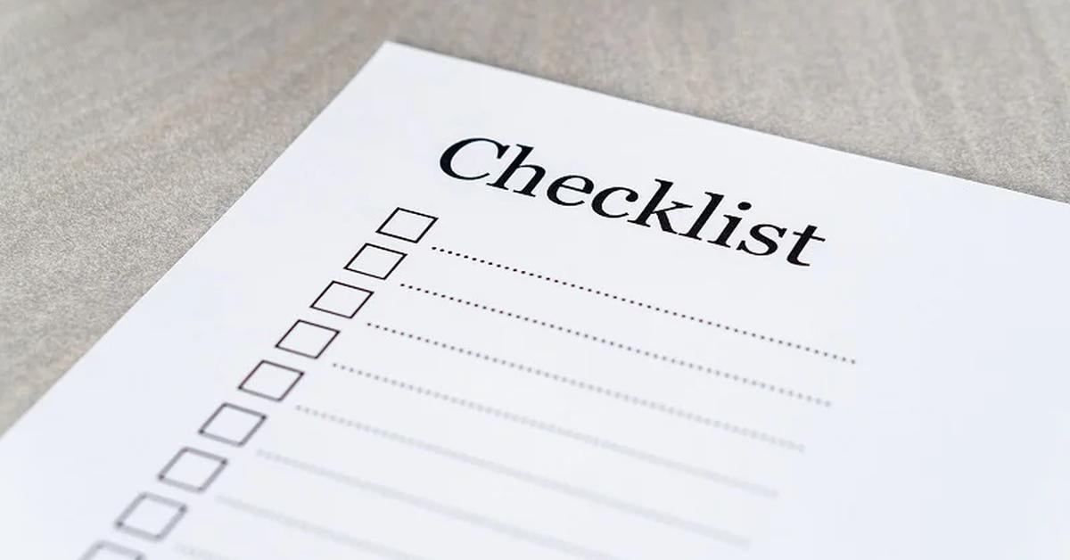 piece of paper with checklist heading and check boxes in a list