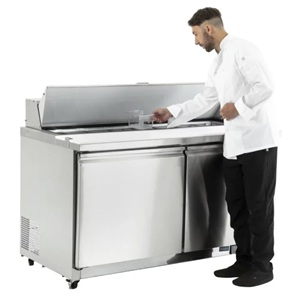 chef standing at prep counter