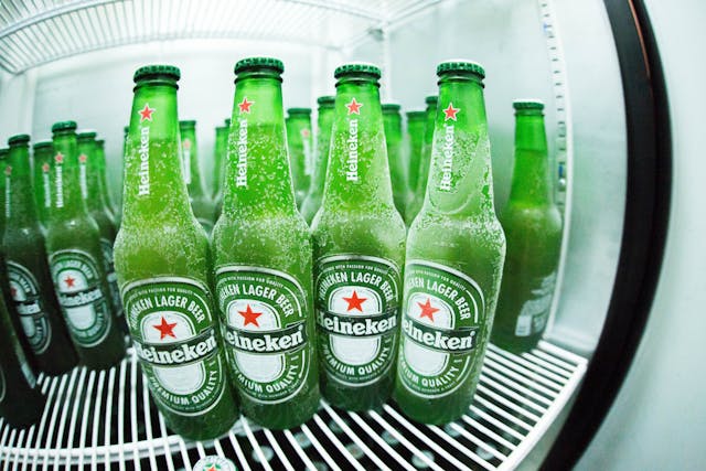 cold beer bottles in a drinks fridge
