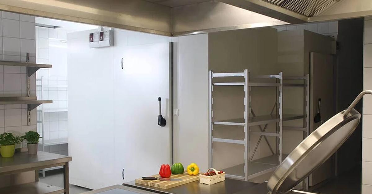 white cold room with closed door in a commercial kitchen