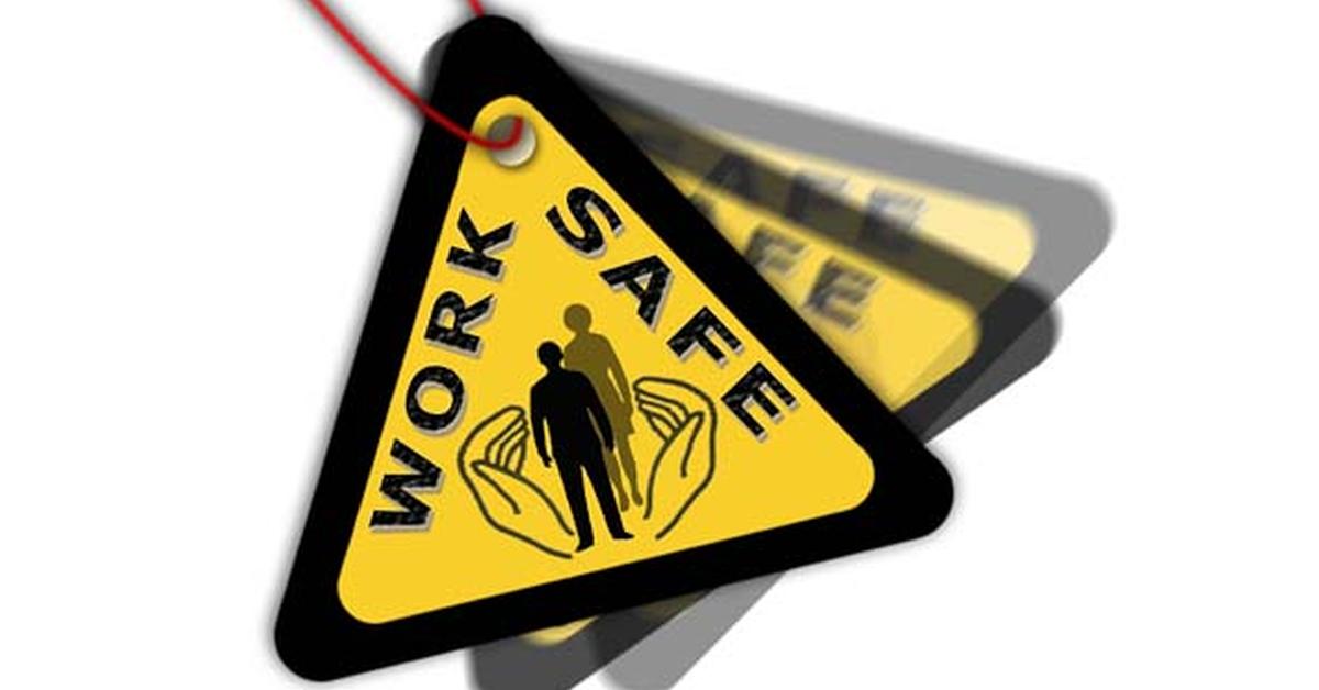 yellow warning triangle with black edge, silhouette of a person in open hands and text 'work safe'