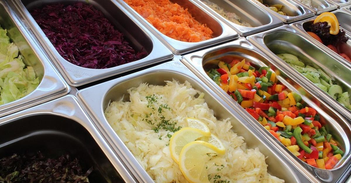 close up image of gastronorm pans filled with food