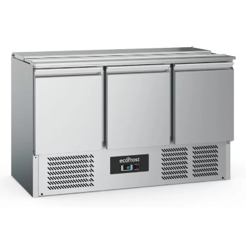 stainless steel food prep counter with three doors